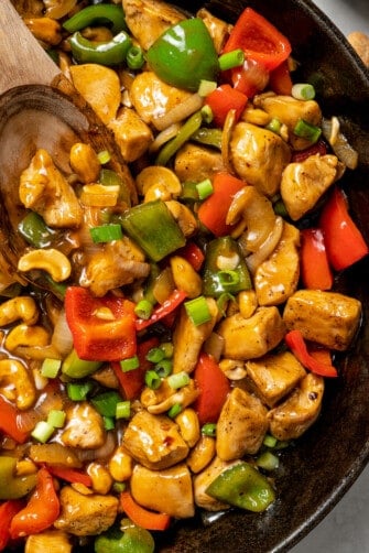 Close up of cashew chicken in a skillet
