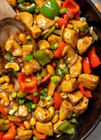 Close up of cashew chicken in a skillet